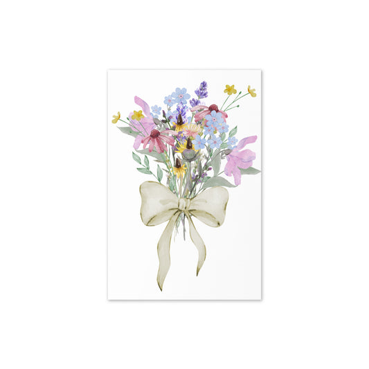 Watercolor painting of a bouquet of flowers with a bow on a white background