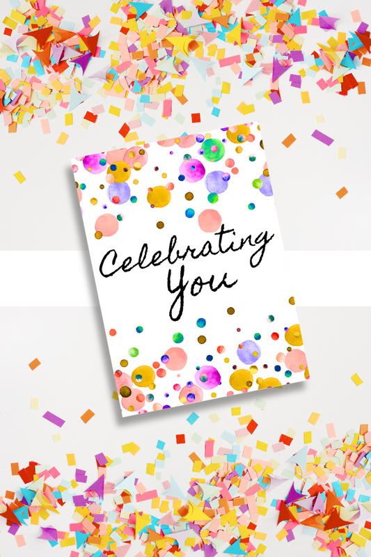 Greeting card with 'Celebrating You' text surrounded by colorful confetti on a white background