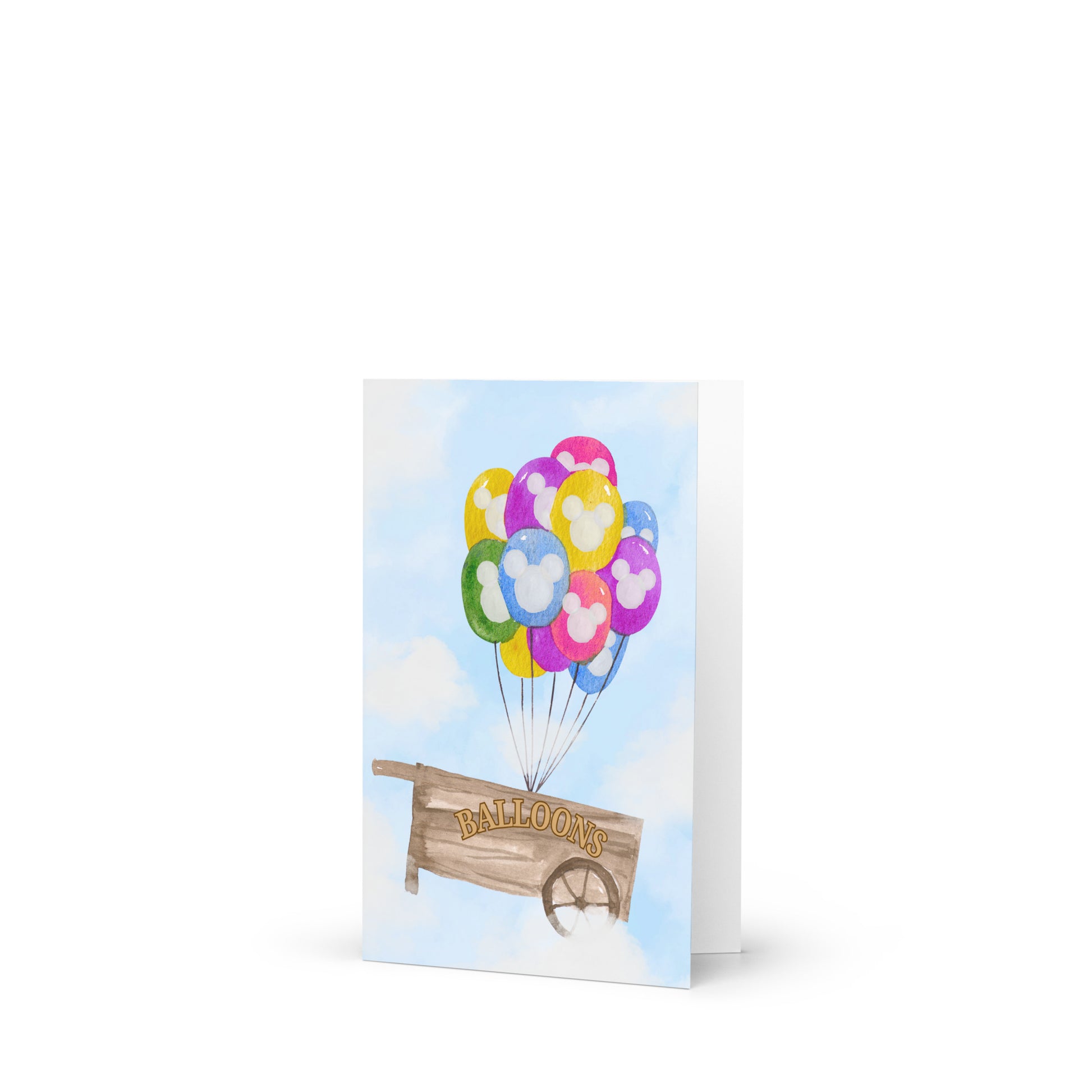Greeting card with colorful balloons and a wooden sign on a white background