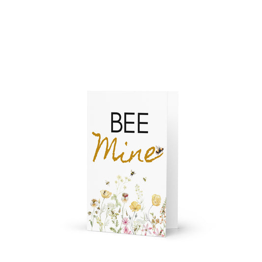 Greeting card with 'BEE Mine' text and floral design on a white background