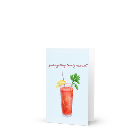 Greeting card with a Bloody Mary illustration with a ring in it and text on a white background
