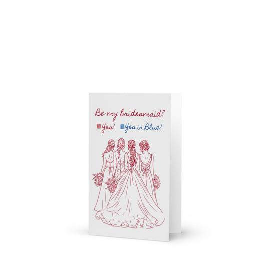 Greeting card with illustration of three women in wedding dresses and text 'Be my bridesmaid? Yes! Yes in Blue!' on a white background.