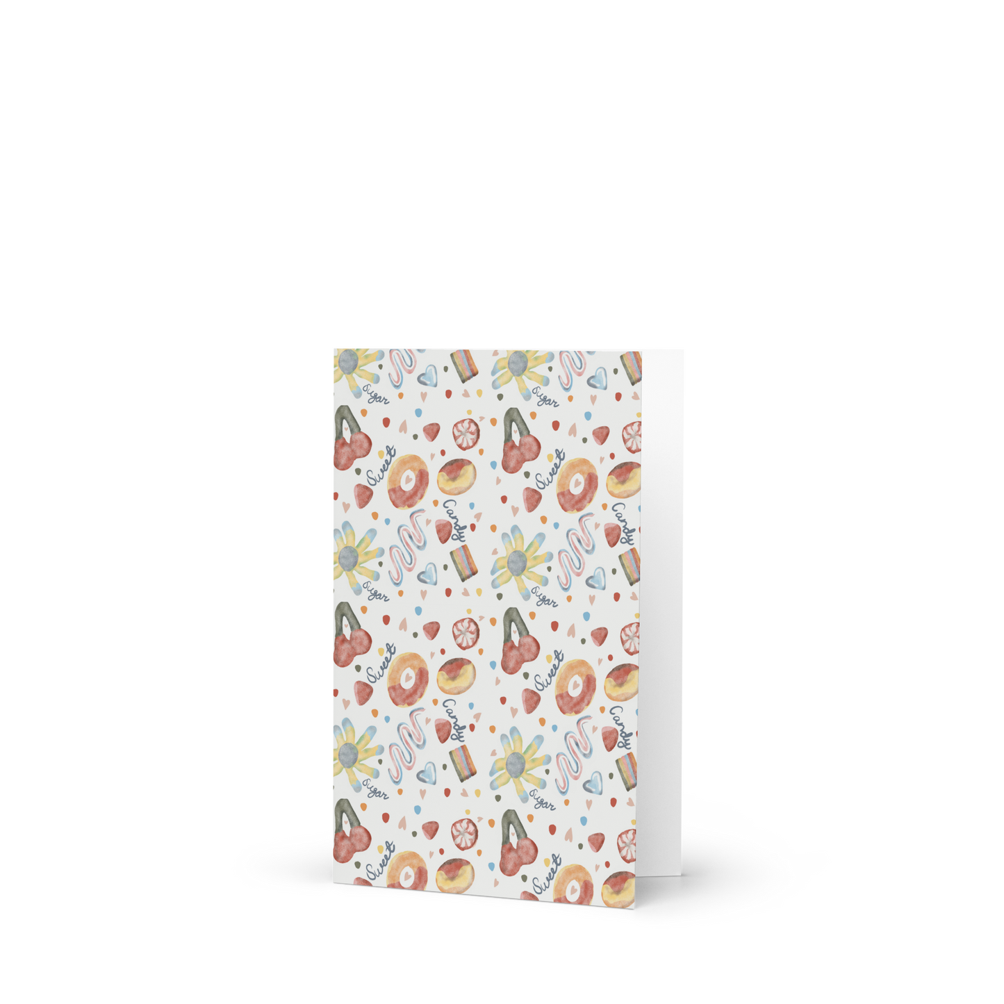 greeting card with colorful candy pattern on a white background