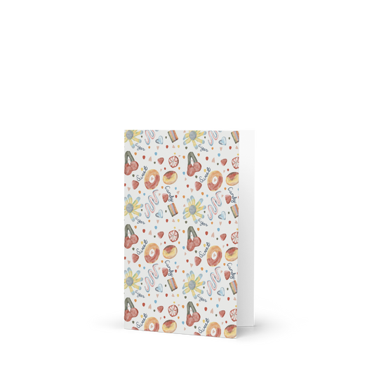 greeting card with colorful candy pattern on a white background