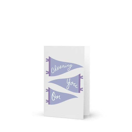 Greeting card with purple flags and 'Cheering You On' text on a white background