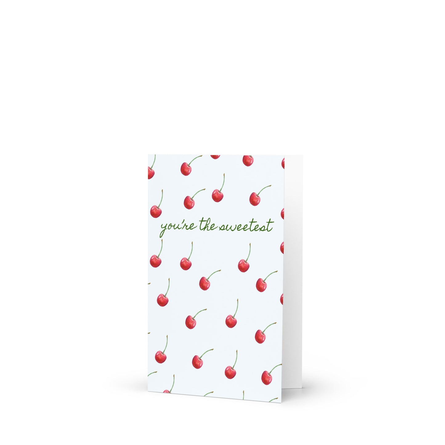 Greeting card with cherry pattern and text 'you're the sweetest' on a white background