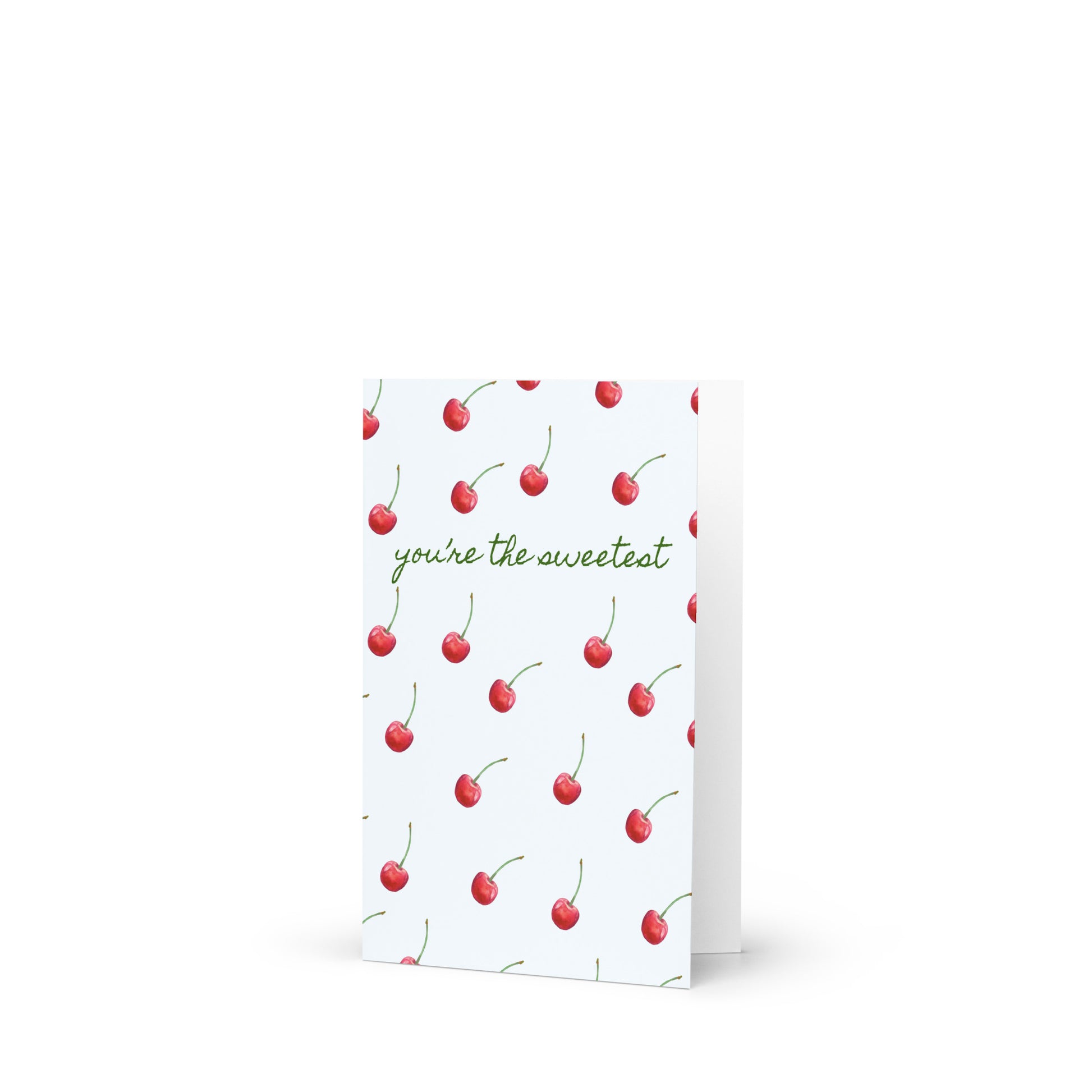 Greeting card with cherry pattern and text 'you're the sweetest' on a white background