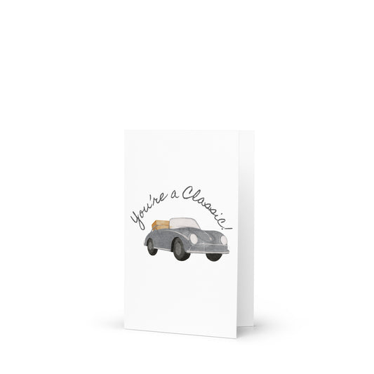 Greeting card with a classic car illustration and 'You're a Classic!' text on a white background