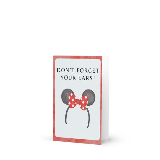 Card with Minnie Mouse ears design and text 'Don't forget your ears!' on a white background