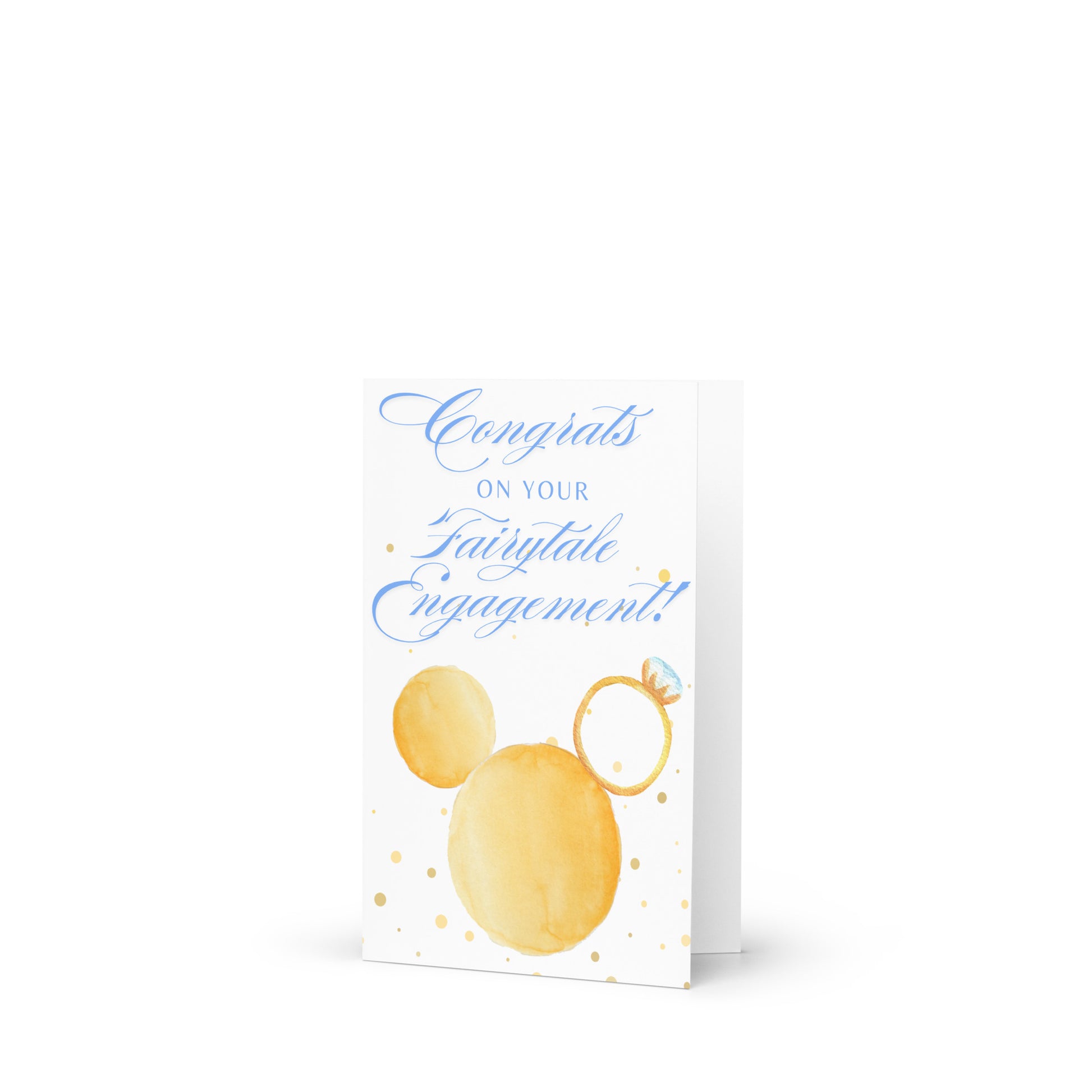 Greeting card with 'Congratulations on your Fairytale Engagement!' text and fairy wings design.