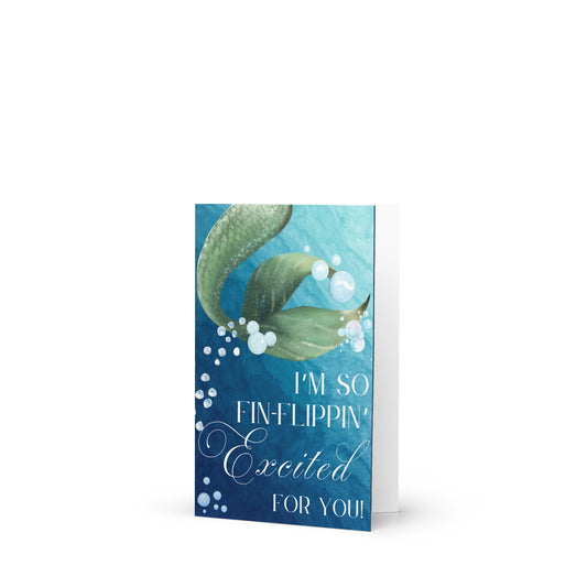 Greeting card with fish and bubbles design on a blue background