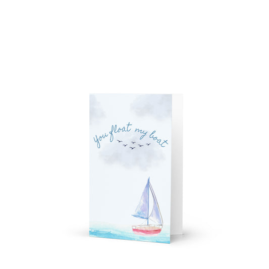 Greeting card with sailboat illustration and 'you float my boat' text on a white background