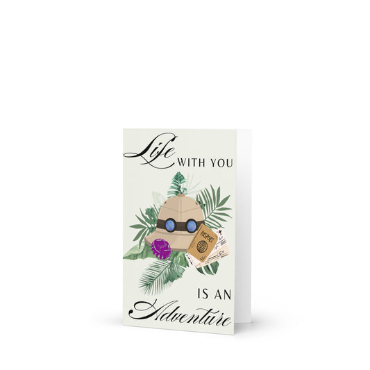 Greeting card with travel-themed design and 'Life with you is an adventure' text on a white background