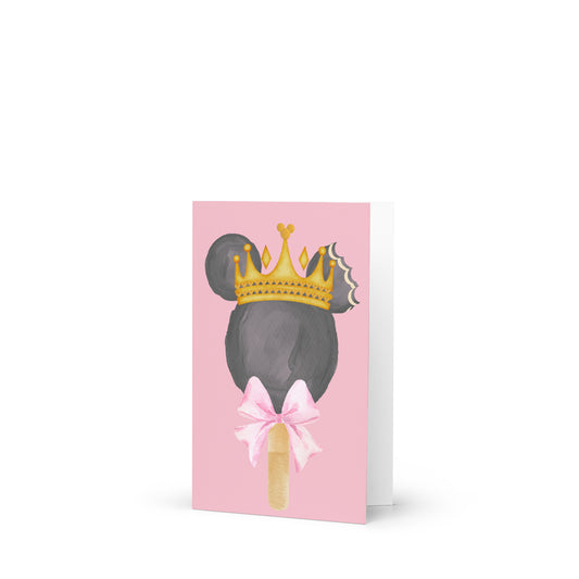 Card with illustration of a popsicle with gray hair, gold crown, and pink bow on a pink background