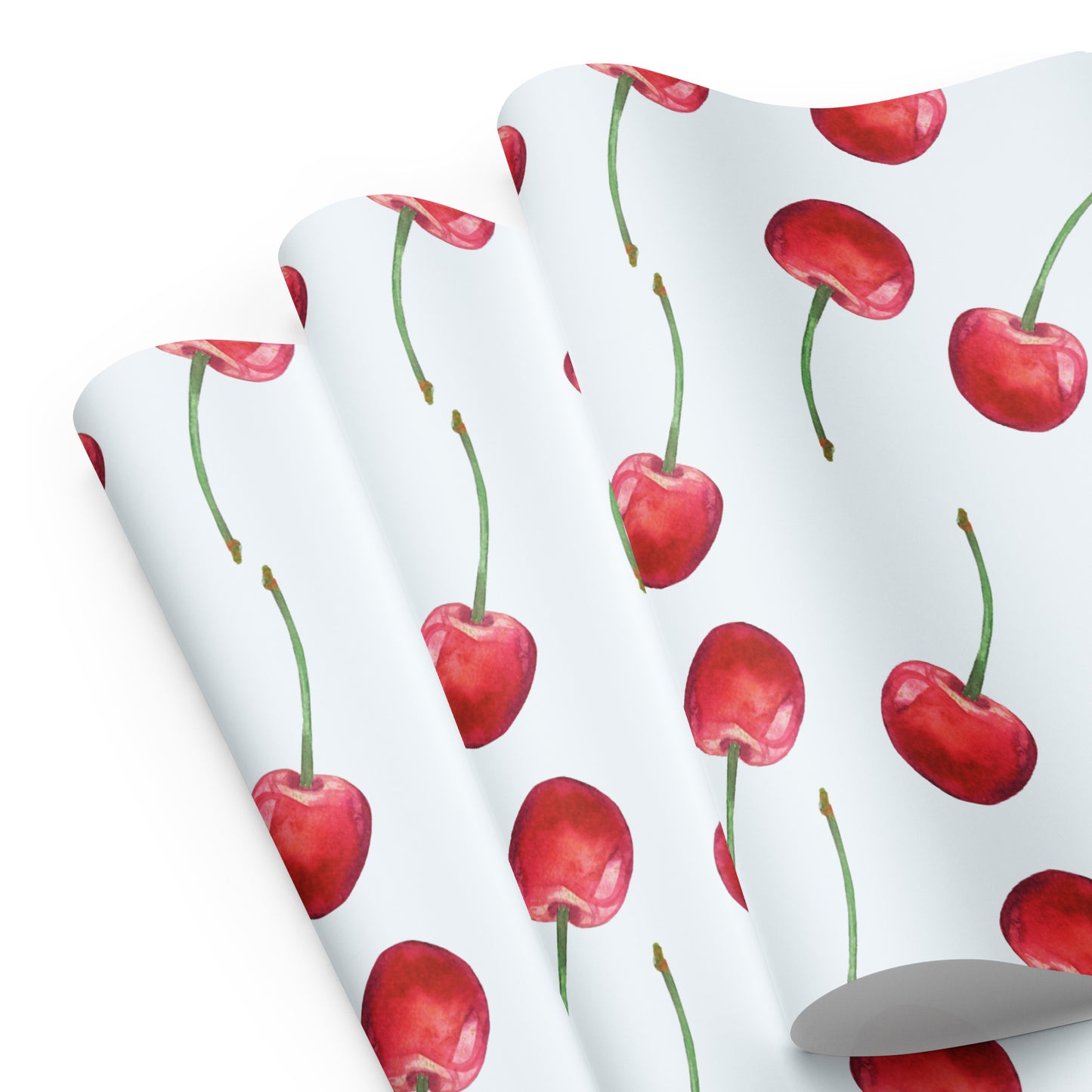Roll of paper with red cherry pattern on a white background