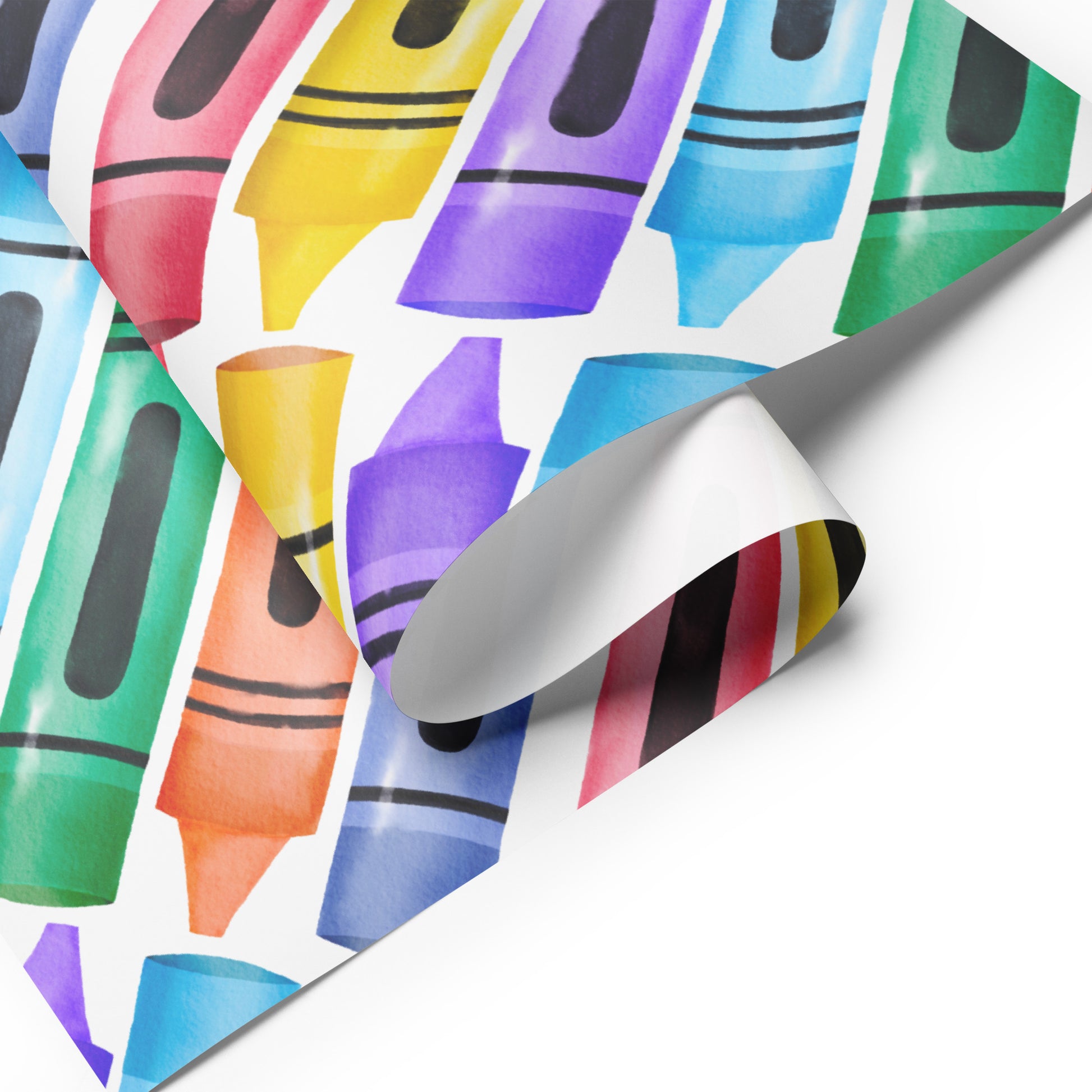 Colorful crayon patterned paper with a roll of paper on a white background