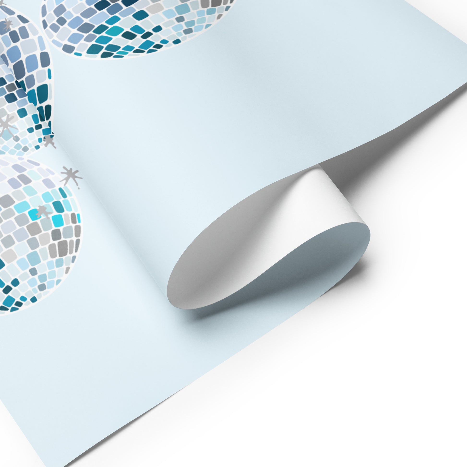 Roll of decorative paper with mosaic pattern on a light blue background