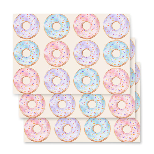 Sticker sheet with colorful donut designs on a white background
