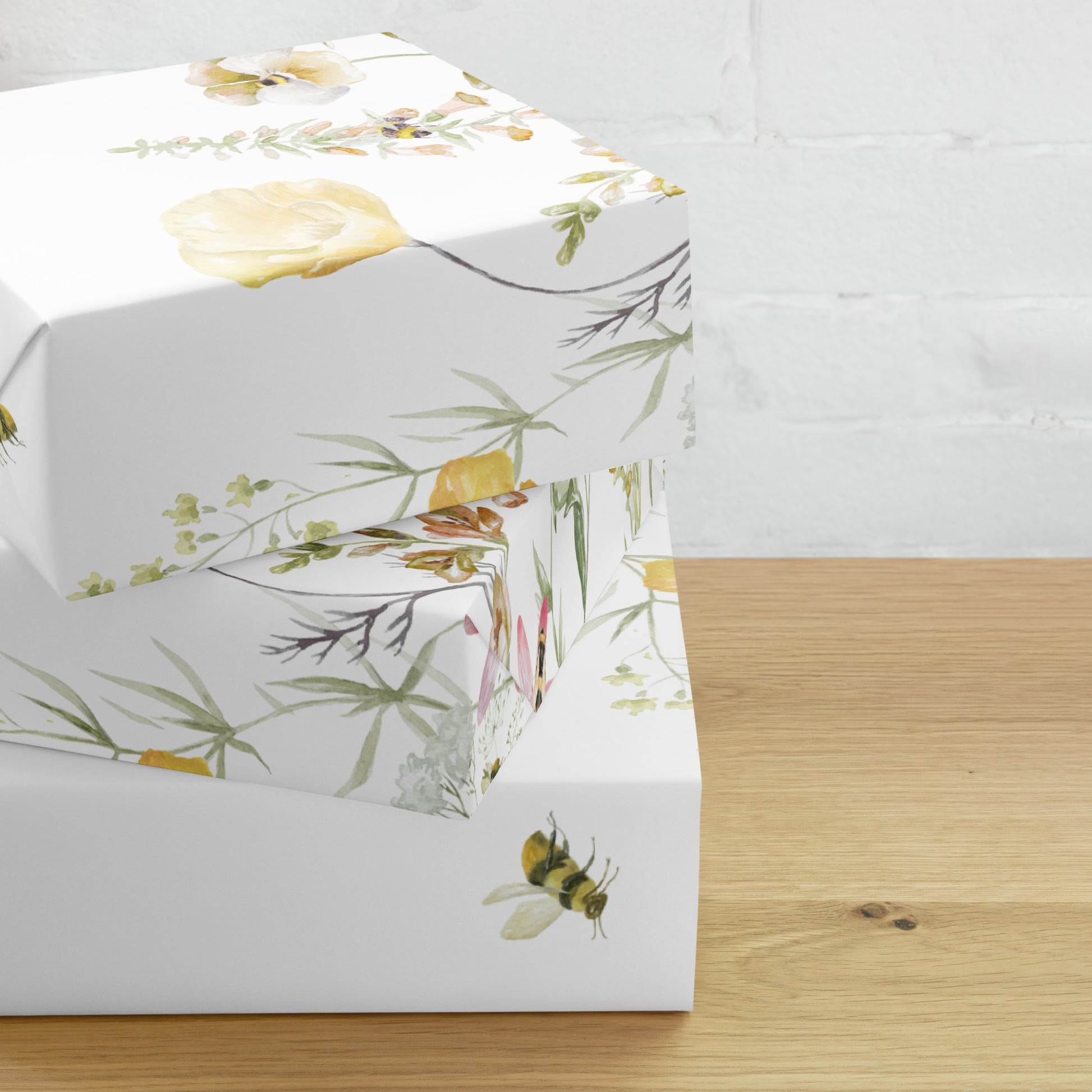 Floral-patterned box on a wooden surface with a white background