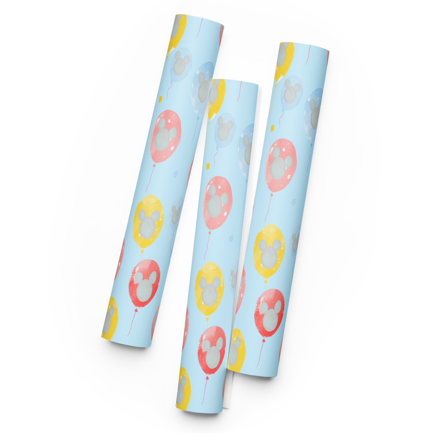 Three cylindrical packages with cartoon character designs on a light blue background