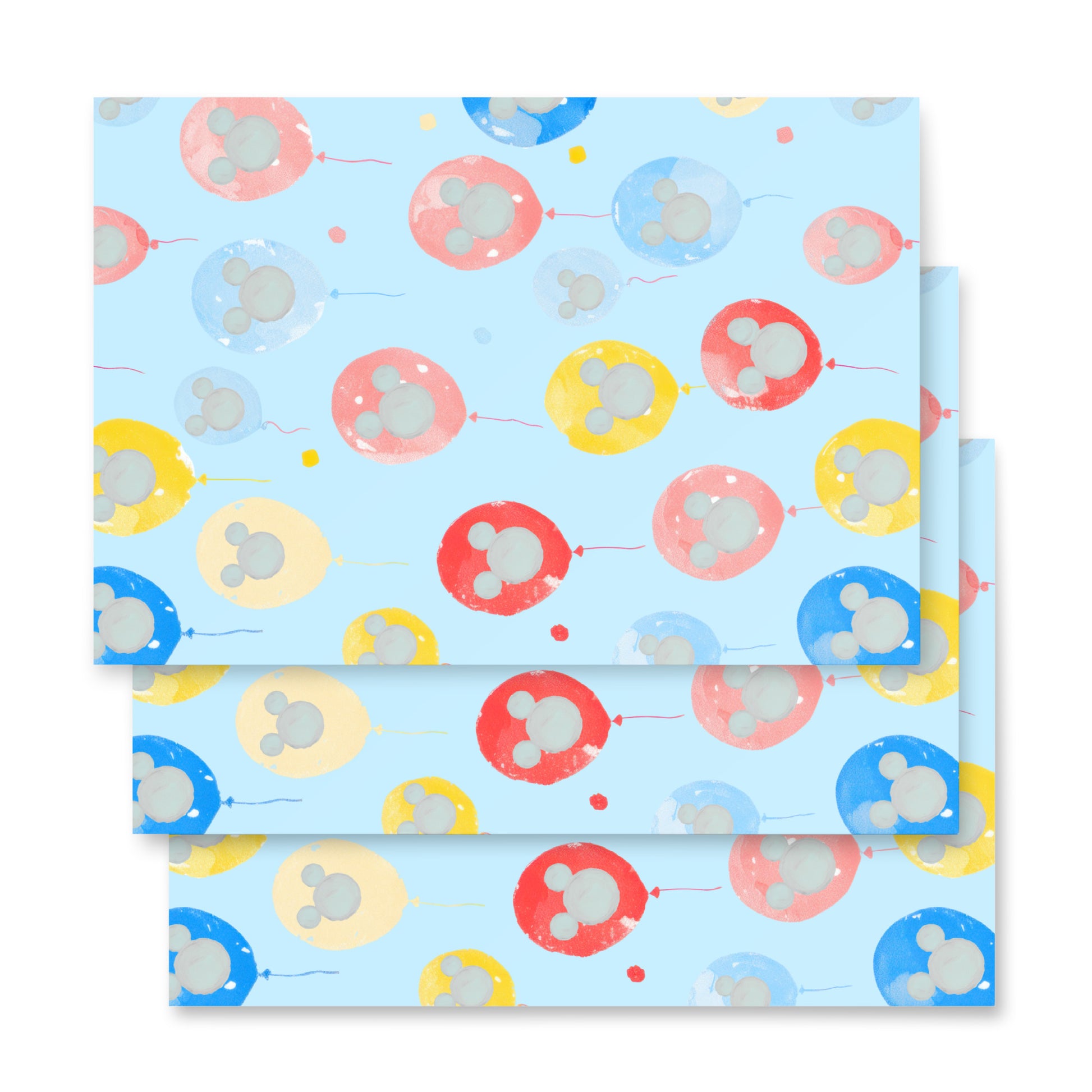 Packaging with colorful balloon pattern on a light blue background