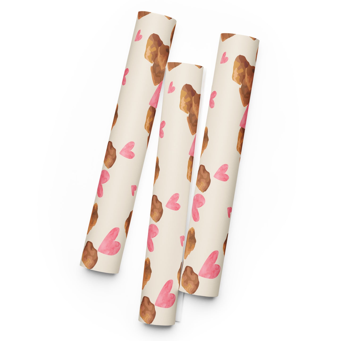 Three cylindrical tubes with a pattern of brown nuggets and pink hearts on a white background