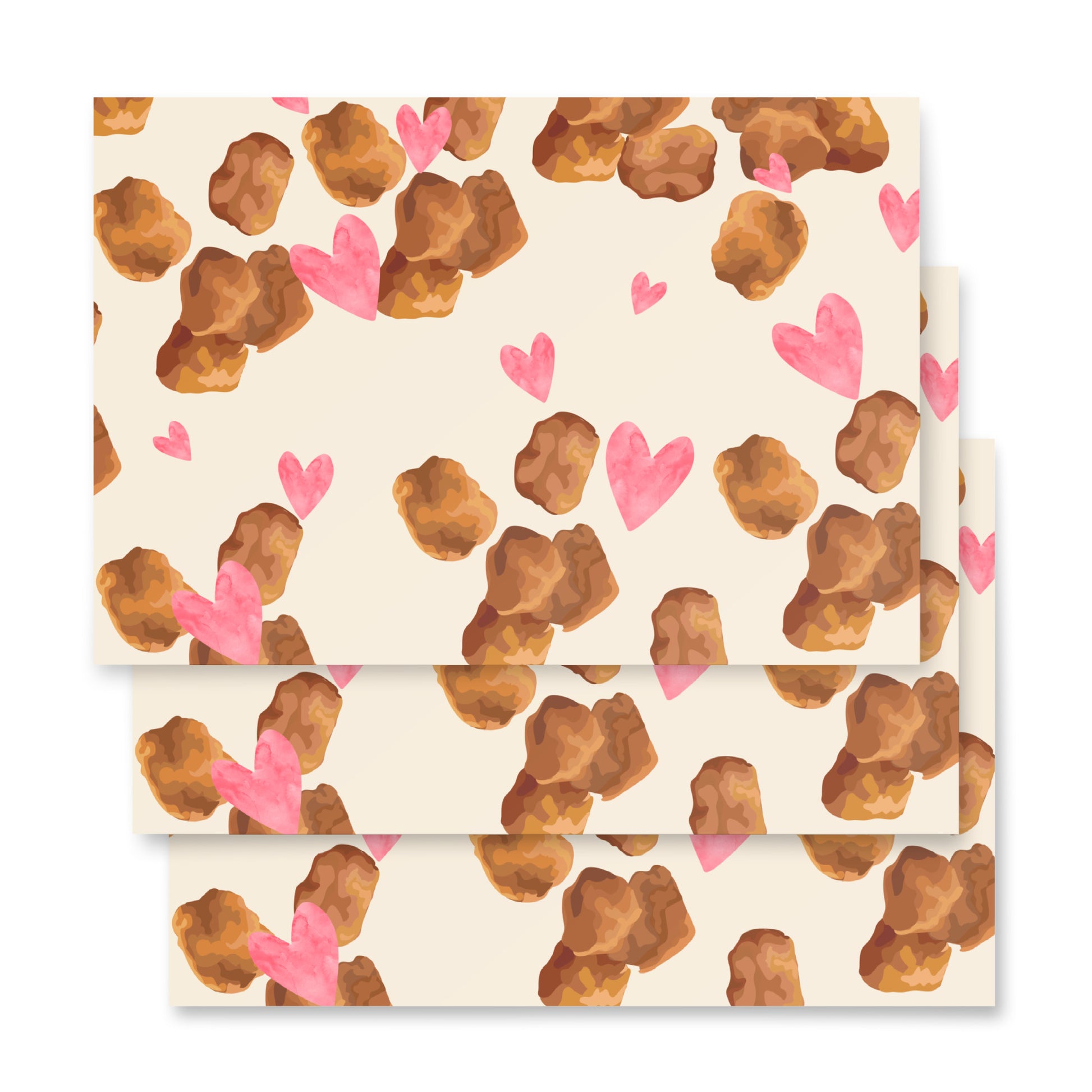Patterned paper with brown shapes and pink hearts on a beige background