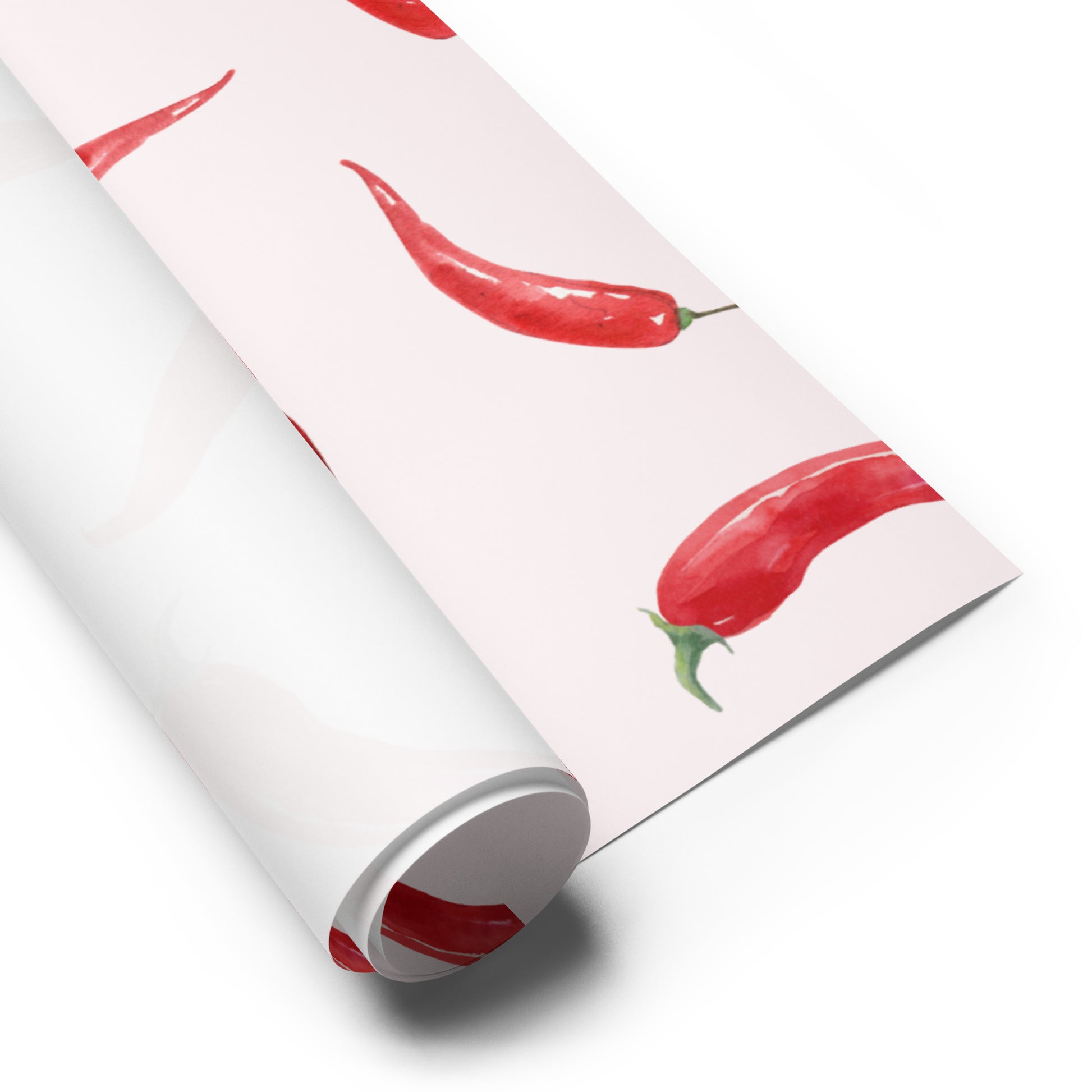 Roll of paper with red chili pepper design on a white background