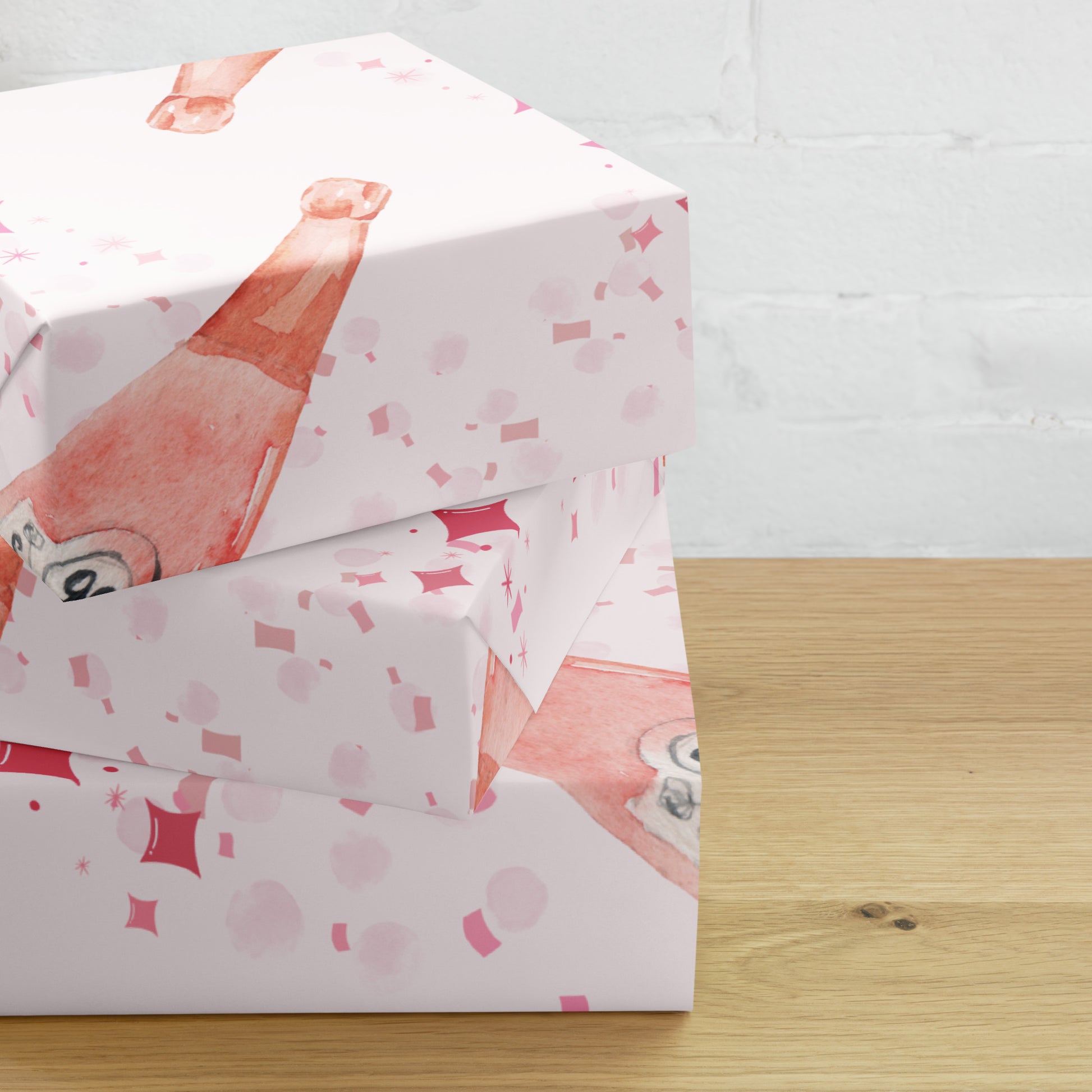 Gift box with pink and white pattern on a wooden surface